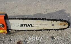 Stihl HT-75 telescopic drive shaft pole chain saw, pruning, 12 bar, working