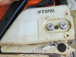 Stihl chain saw withfarm boss 20 bar chain for parts/repair does run vtg 1990s